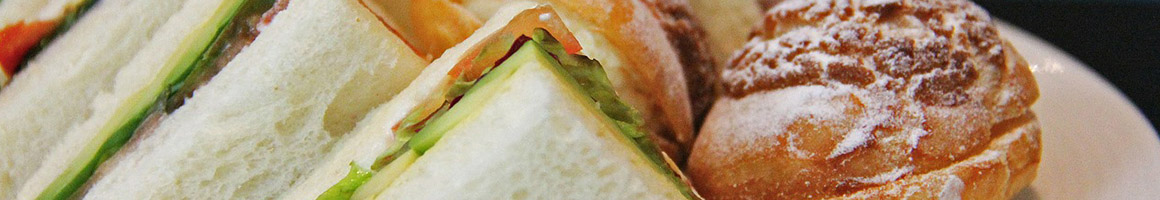 Eating Sandwich at Blazing Bagels restaurant in Seattle, WA.